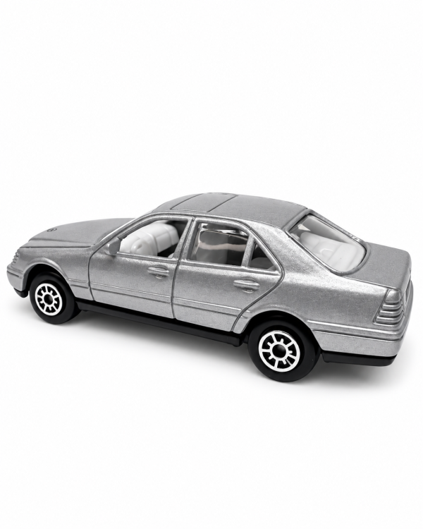 ChatGPT Image Sep 16, 2026, 07_28_05 PM Vintage Welly Mercedes-Benz C-Class Diecast Model Car – Silver